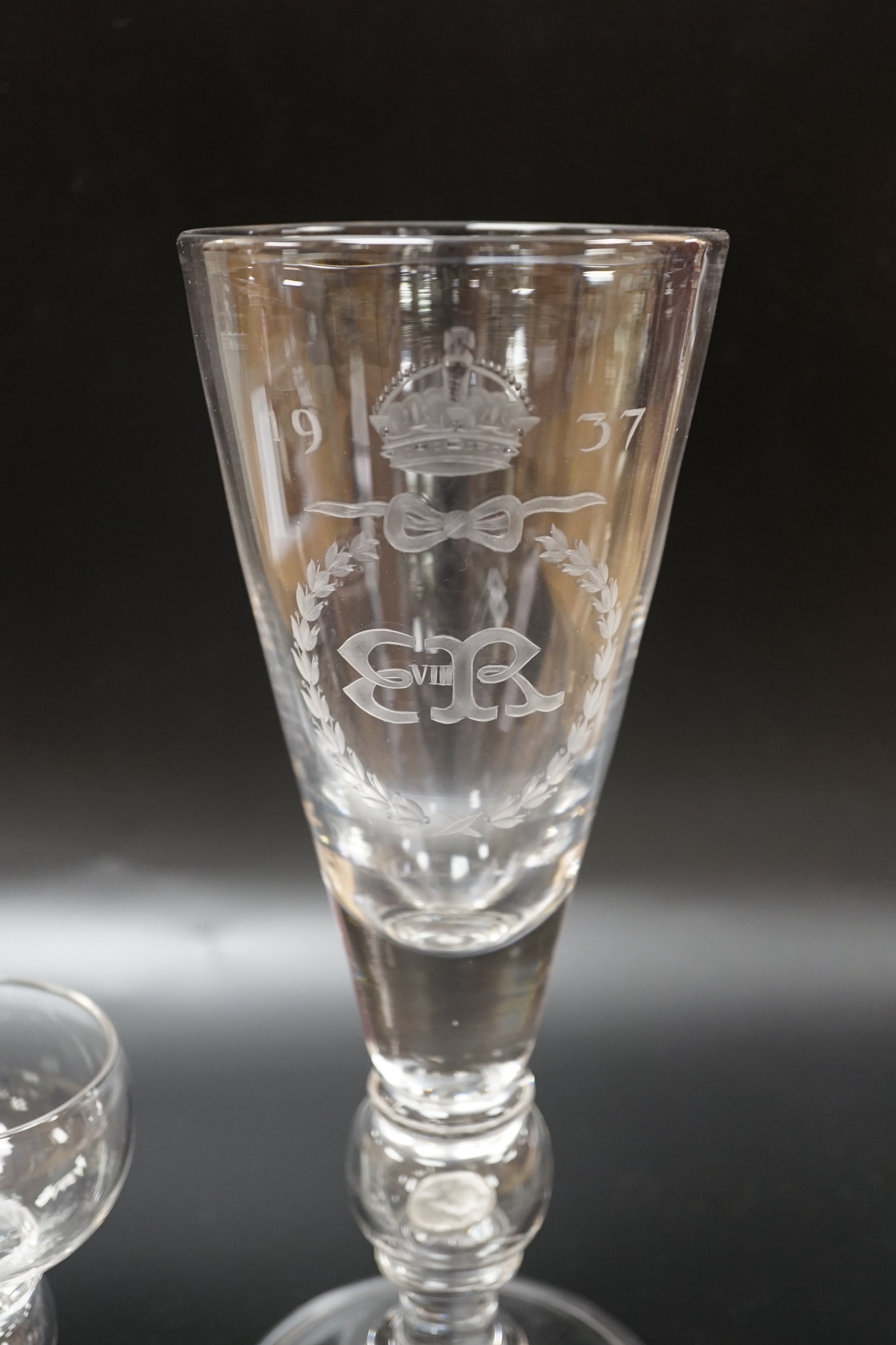 A large Edward VIII commemorative trumpet goblet with etched glass design dated 1937, together with a small commemorative glass with similar etching and ‘God Save The King’ etched around the foot, both with a commemorati